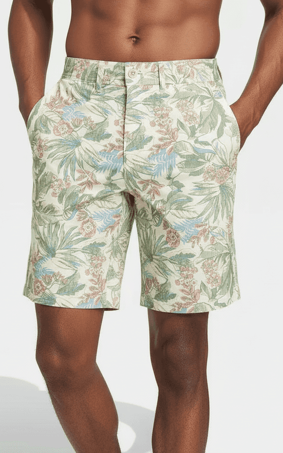 Short Híbrido con Estampado Botánico Crema, corte largo, estampado floral vintage, cierre con cremallera para look de playa elegante